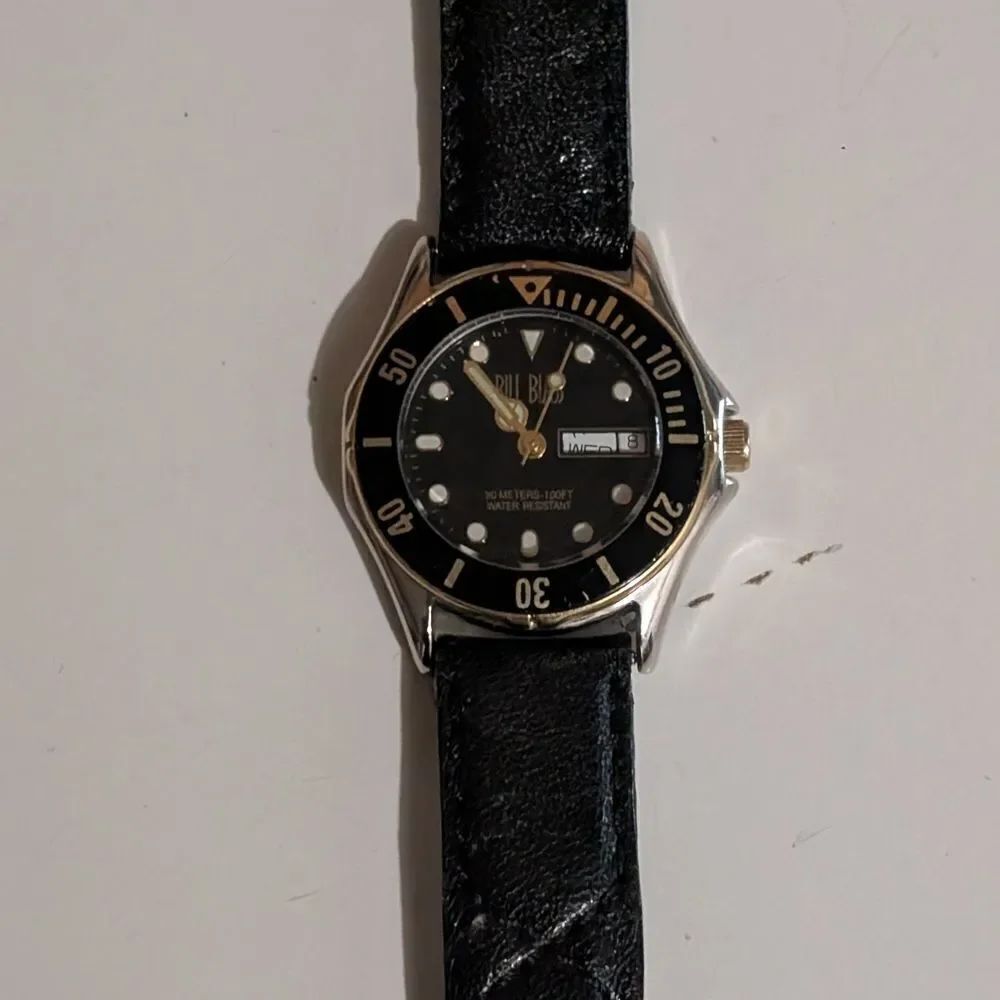 Bill Blass Black/Gold Watch